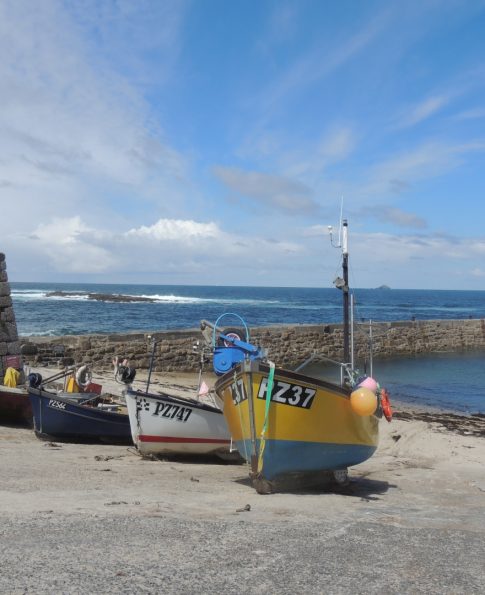 Fishing boats in Sennen Cove harbour, on the West Cornwall guided tour